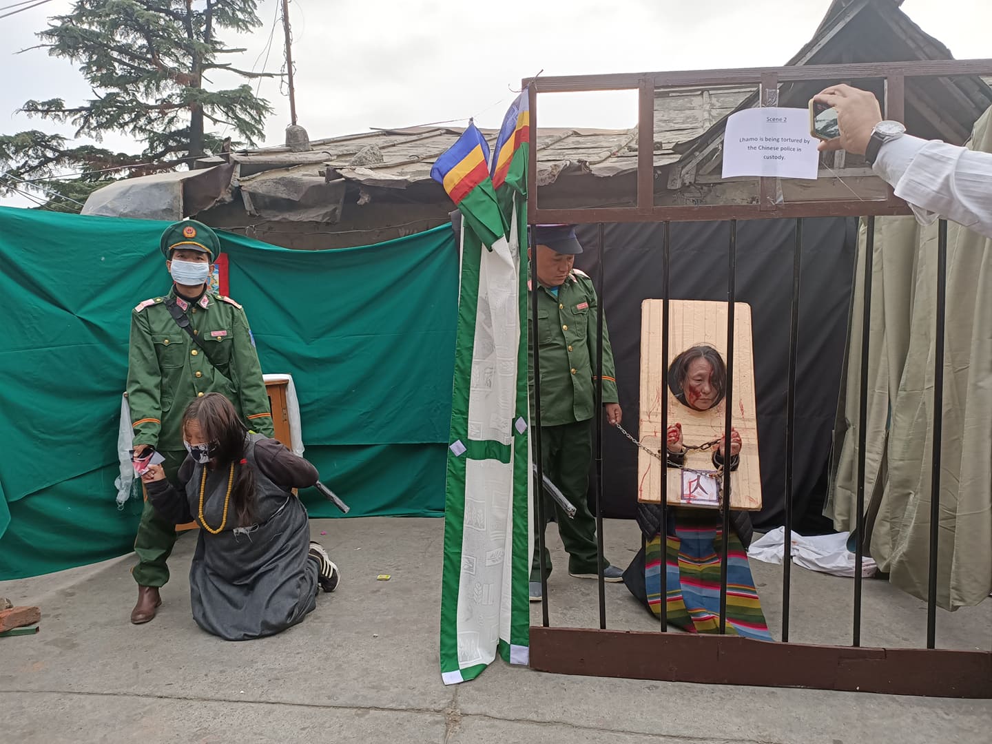 Read more about the article Street theatre depicting illegal arrests in Tibet